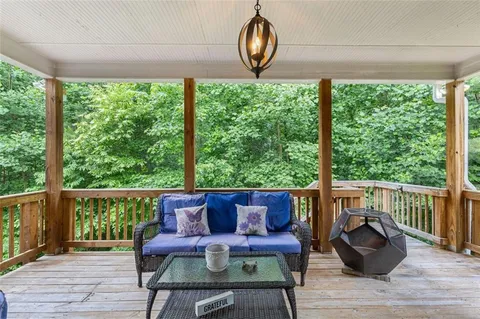 a bedroom with a bed and a lamp