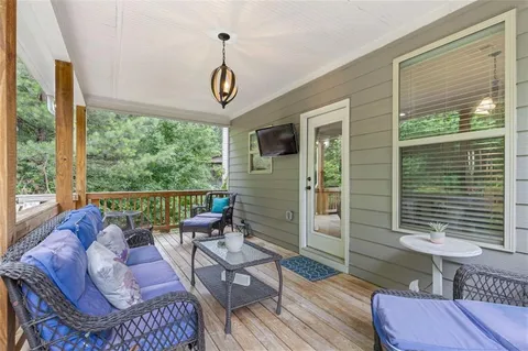 a spacious bathroom with a double vanity sink a large mirror and a shower