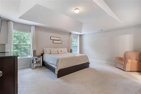 a bathroom with a sink vanity and a mirror
