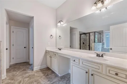 a bedroom with a bed and a cabinets