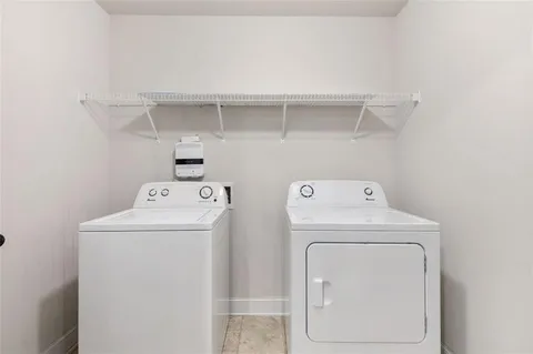 a view of backyard with outdoor seating and trees