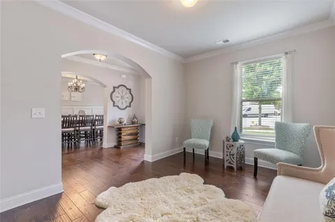 a view of a dining room with furniture window and outside view