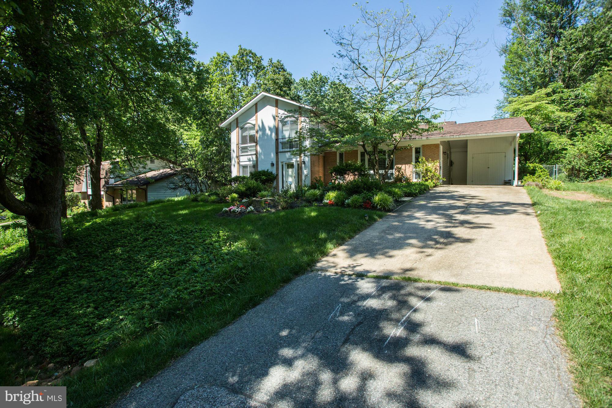 12906 Buccaneer Road Silver Spring, MD 20904 - Photo 2 of 30 a view of a house with a yard