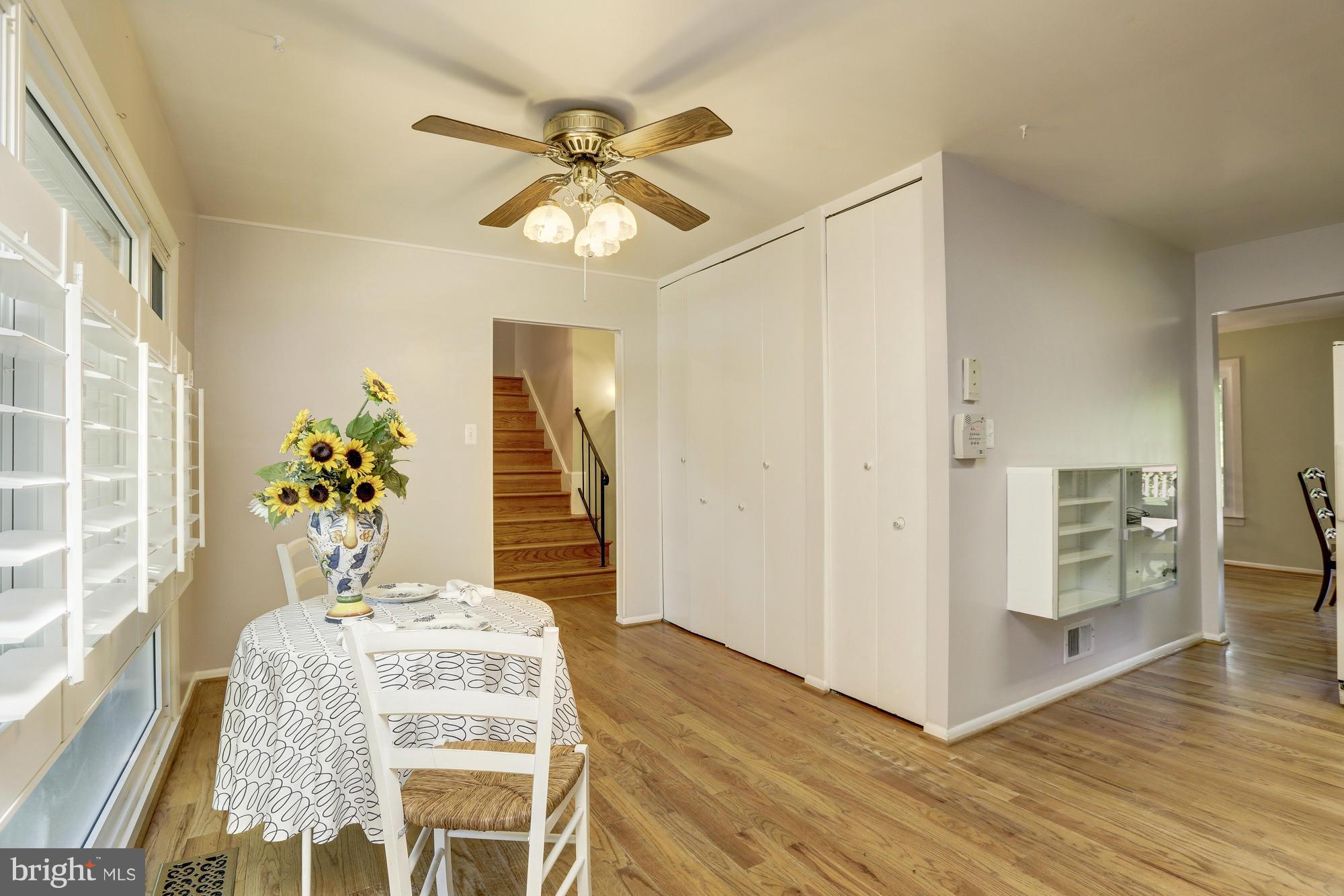 12906 Buccaneer Road Silver Spring, MD 20904 - Photo 12 of 30 a view of a dining room with furniture and wooden floor
