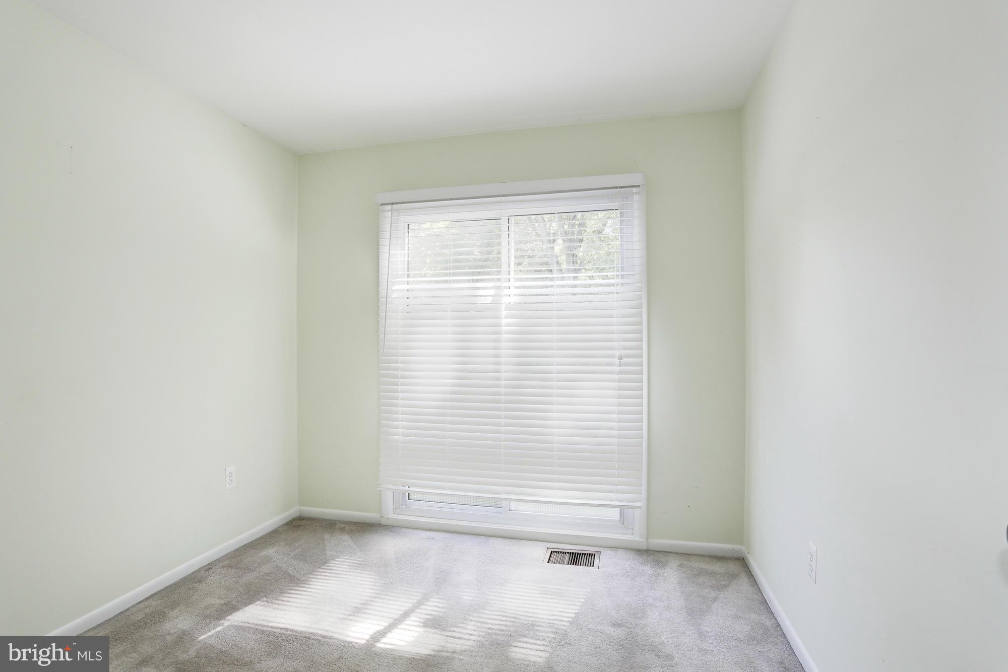 12906 Buccaneer Road Silver Spring, MD 20904 - Photo 16 of 30 a view of an empty room with a window