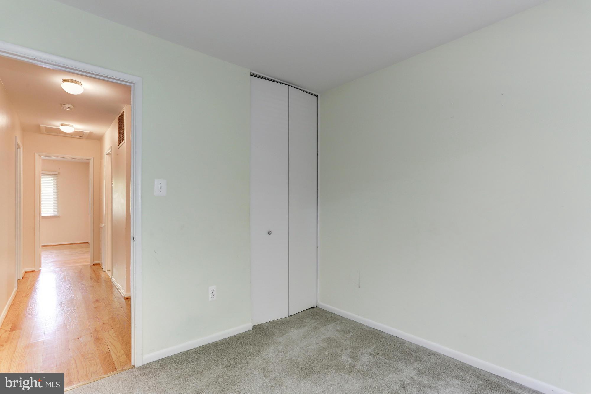 12906 Buccaneer Road Silver Spring, MD 20904 - Photo 17 of 30 a view of an empty room and wooden floor