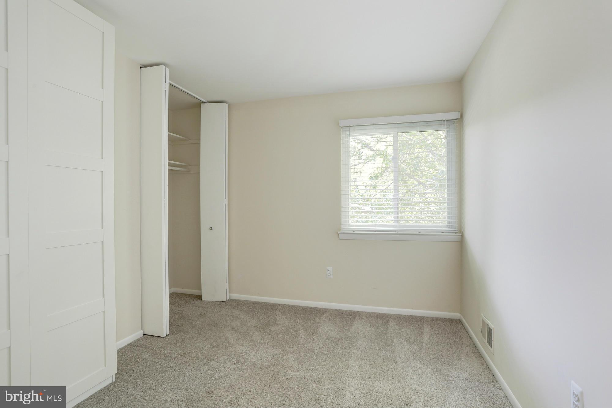 12906 Buccaneer Road Silver Spring, MD 20904 - Photo 19 of 30 an empty room with windows