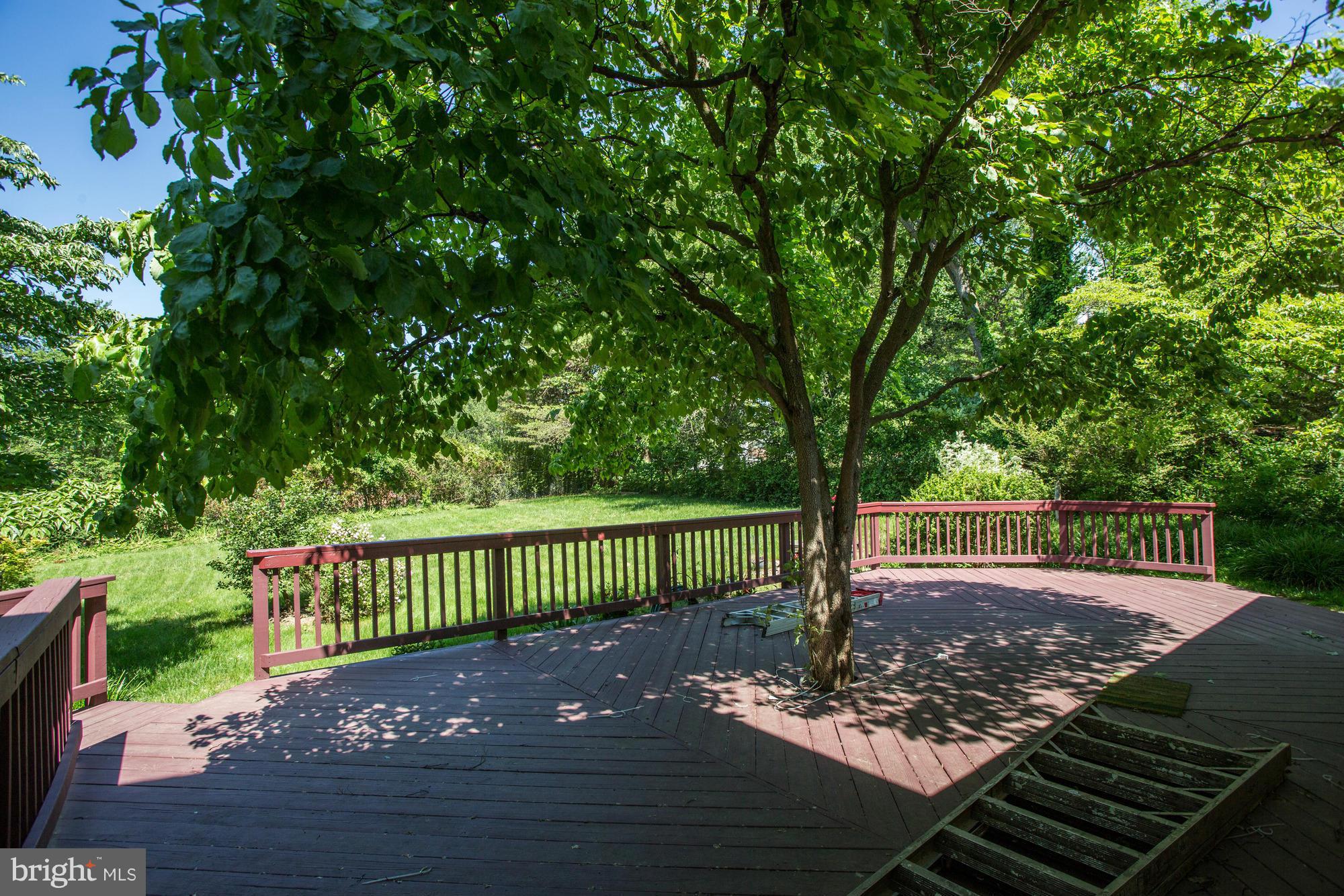 12906 Buccaneer Road Silver Spring, MD 20904 - Photo 27 of 30 a view of a patio with a table and chairs