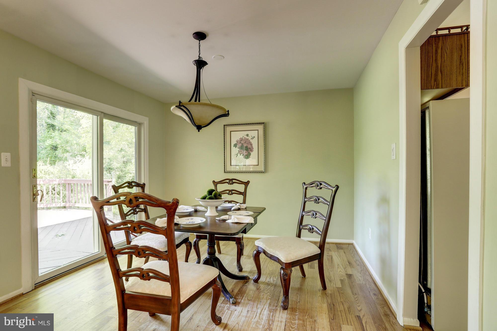 12906 Buccaneer Road Silver Spring, MD 20904 - Photo 8 of 30 a dining room with furniture window wooden floor