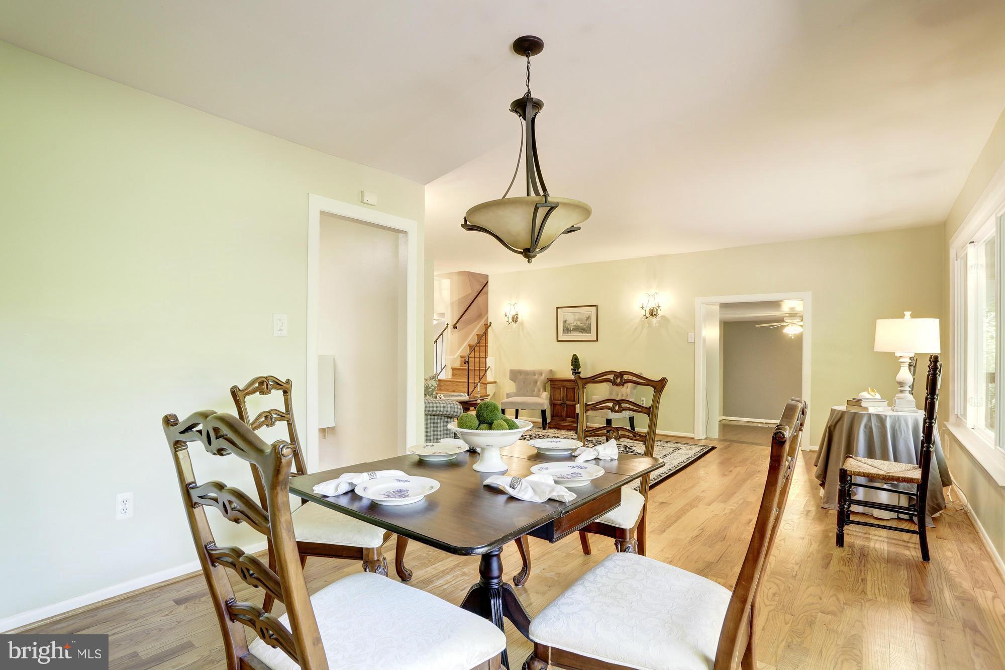 12906 Buccaneer Road Silver Spring, MD 20904 - Photo 9 of 30 a view of a dining room with furniture and wooden floor