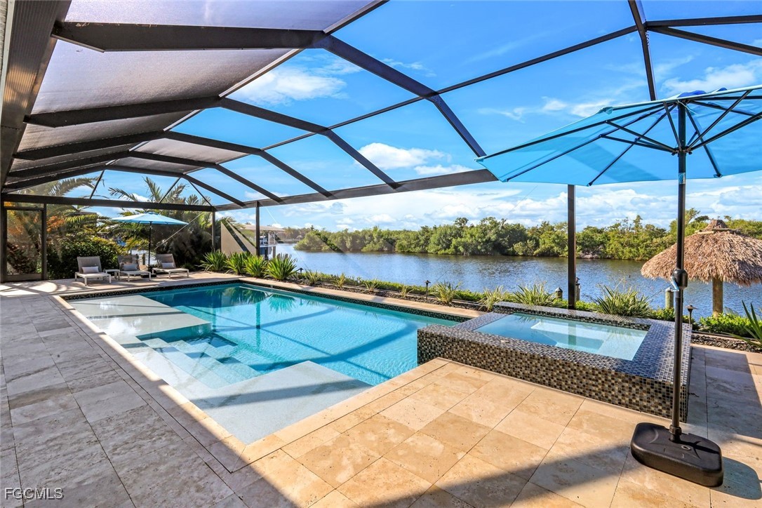2906 Southwest 29th Terrace Cape Coral, FL 33914 - Photo 2 of 49 a view of a backyard with sitting area