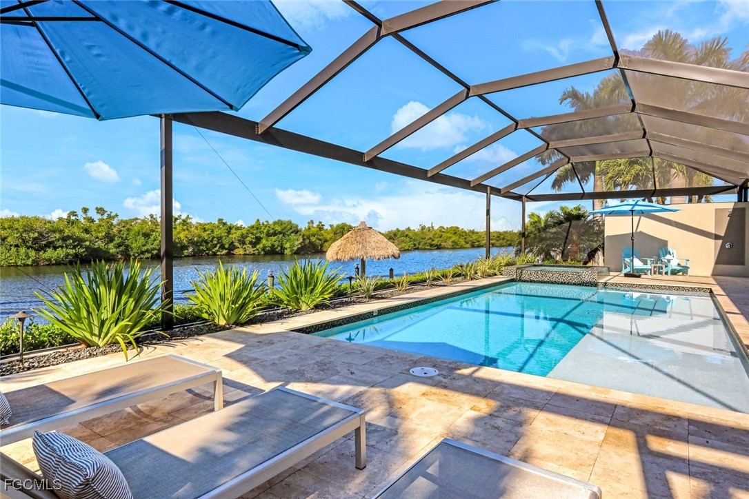 2906 Southwest 29th Terrace Cape Coral, FL 33914 - Photo 3 of 49 a view of a balcony with lake view and a ocean view