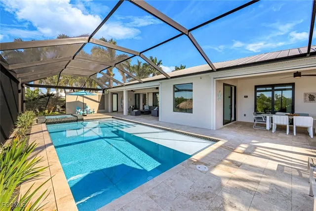 a view of a house with swimming pool