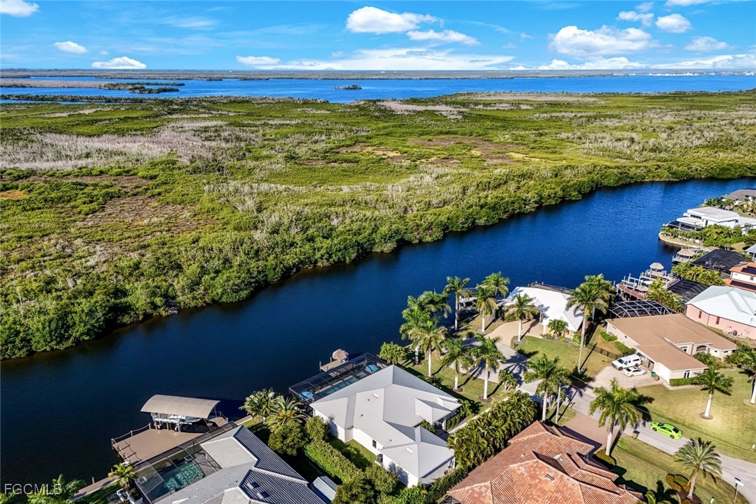 2906 Southwest 29th Terrace Cape Coral, FL 33914 - Photo 46 of 49 a view of an ocean and beach