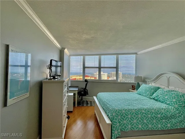 a bathroom with double vanity sink and mirror