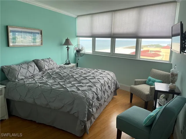 a bathroom with a sink toilet vanity and shower