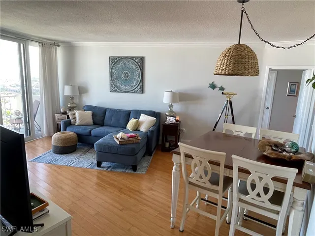 a view of a balcony with chairs