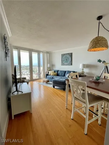 a bedroom with a bed furniture and a window