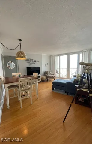 a bedroom with a bed and cabinets