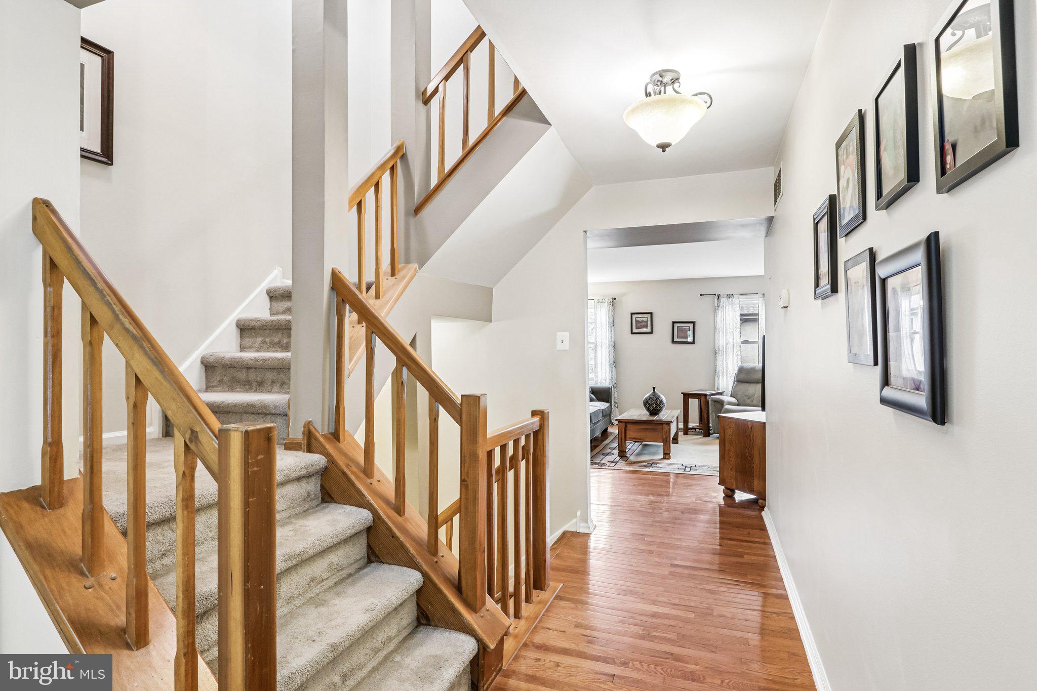 36 Independence Place, Unit 36 Chesterbrook, PA 19087 - Photo 6 of 55 a view of a hallway with wooden floor and staircase
