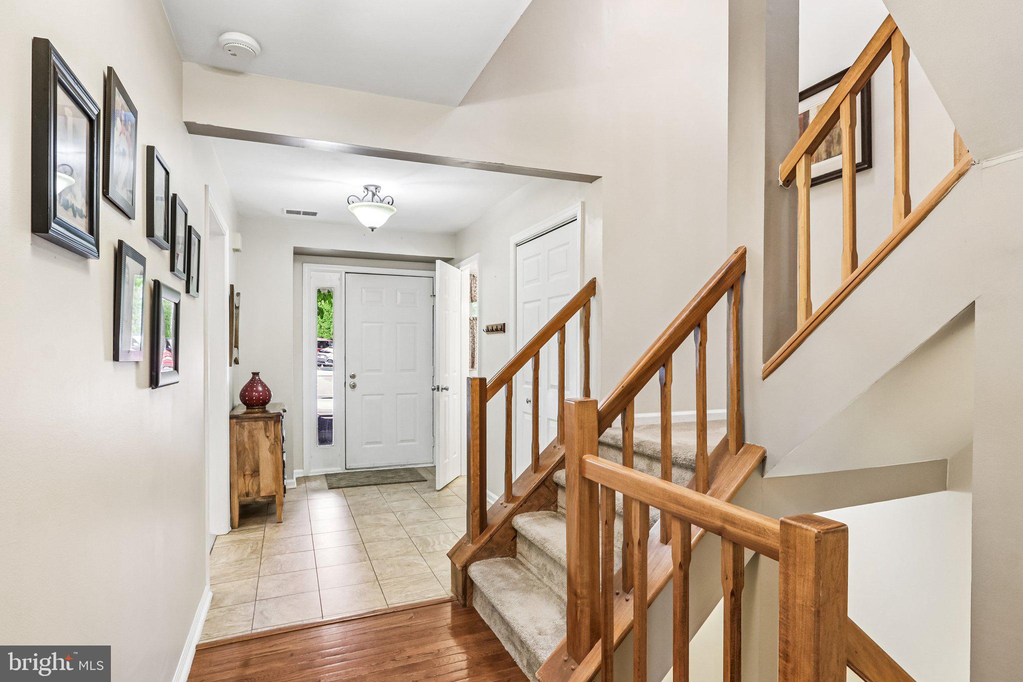 36 Independence Place, Unit 36 Chesterbrook, PA 19087 - Photo 8 of 55 a view of an entryway with wooden floor and stairs