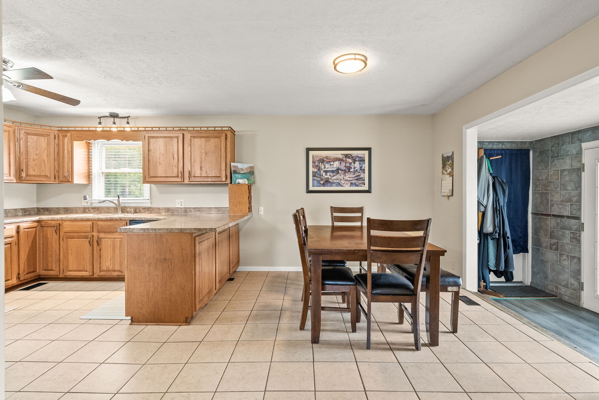 674 Lakeside Drive Springfield, TN 37172 - Photo 16 of 44 a view of a dining room with furniture and a kitchen