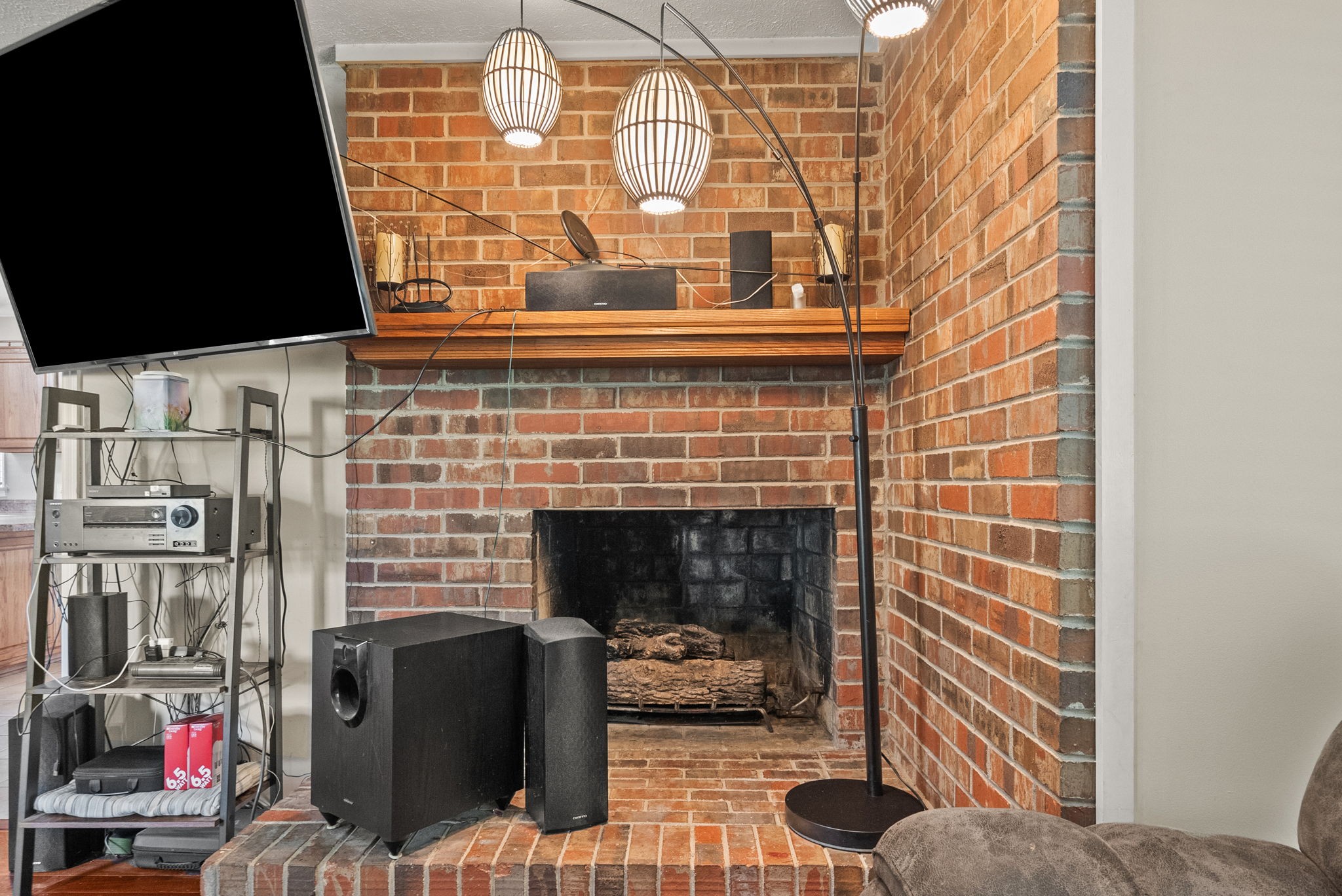 674 Lakeside Drive Springfield, TN 37172 - Photo 21 of 44 a living room with furniture a flat screen tv and a fireplace