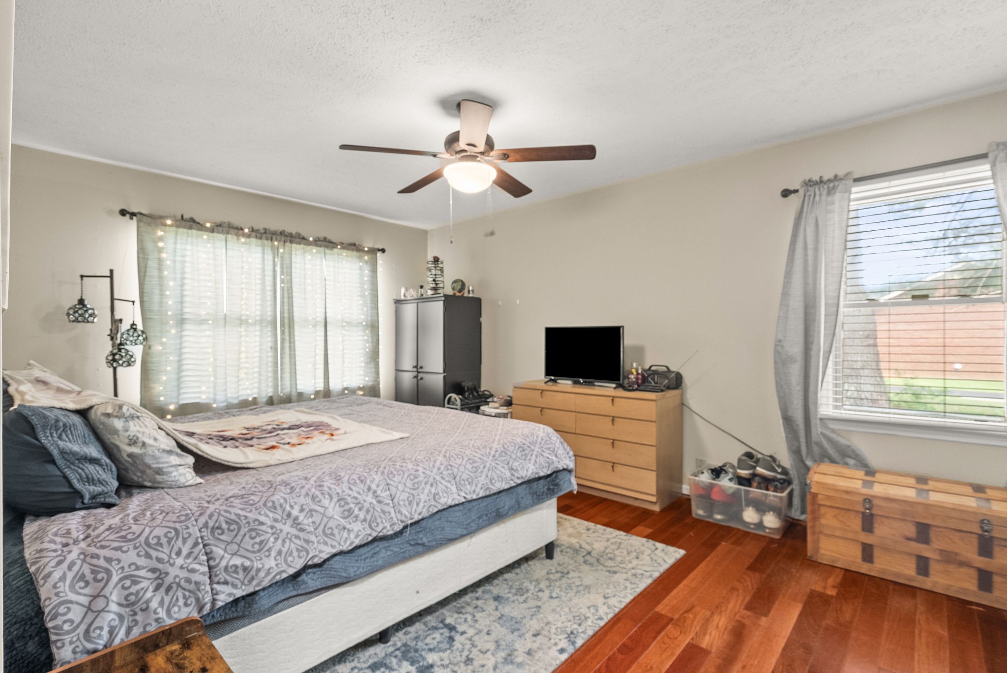674 Lakeside Drive Springfield, TN 37172 - Photo 23 of 44 a bedroom with a bed and wooden floor