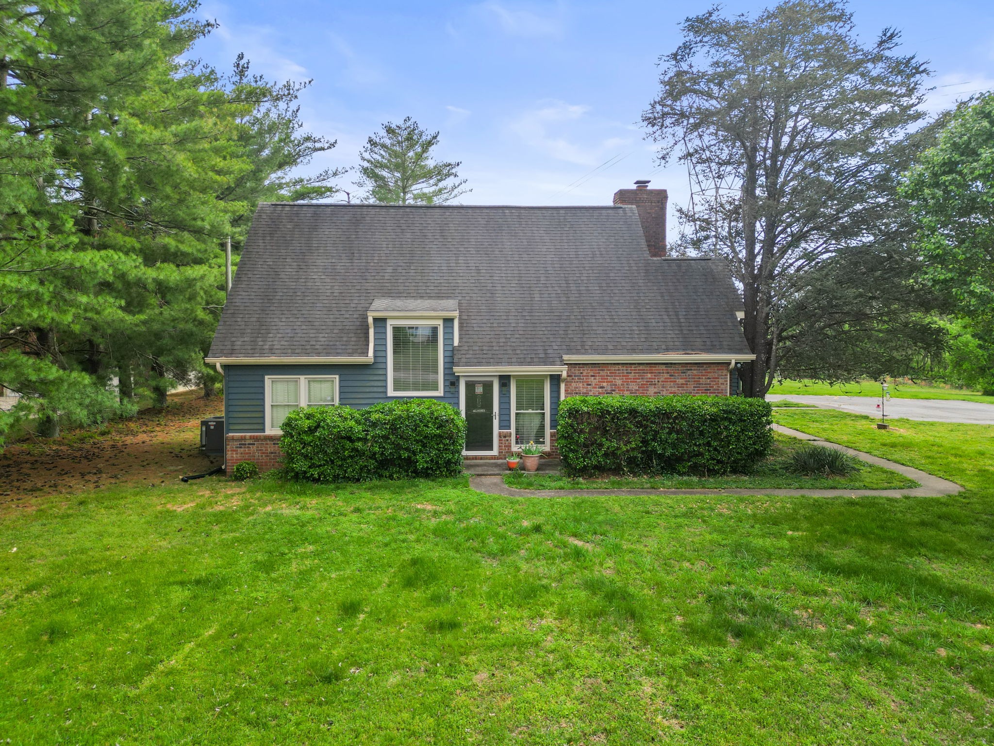 674 Lakeside Drive Springfield, TN 37172 - Photo 7 of 44 a front view of a house with a yard and trees