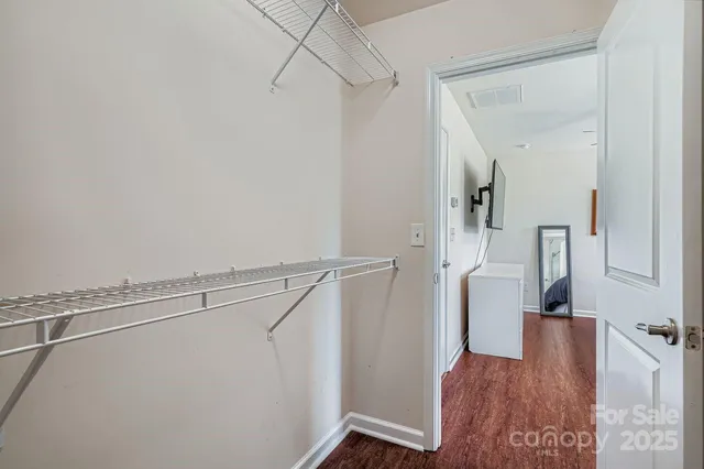 a view of entryway with wooden floor