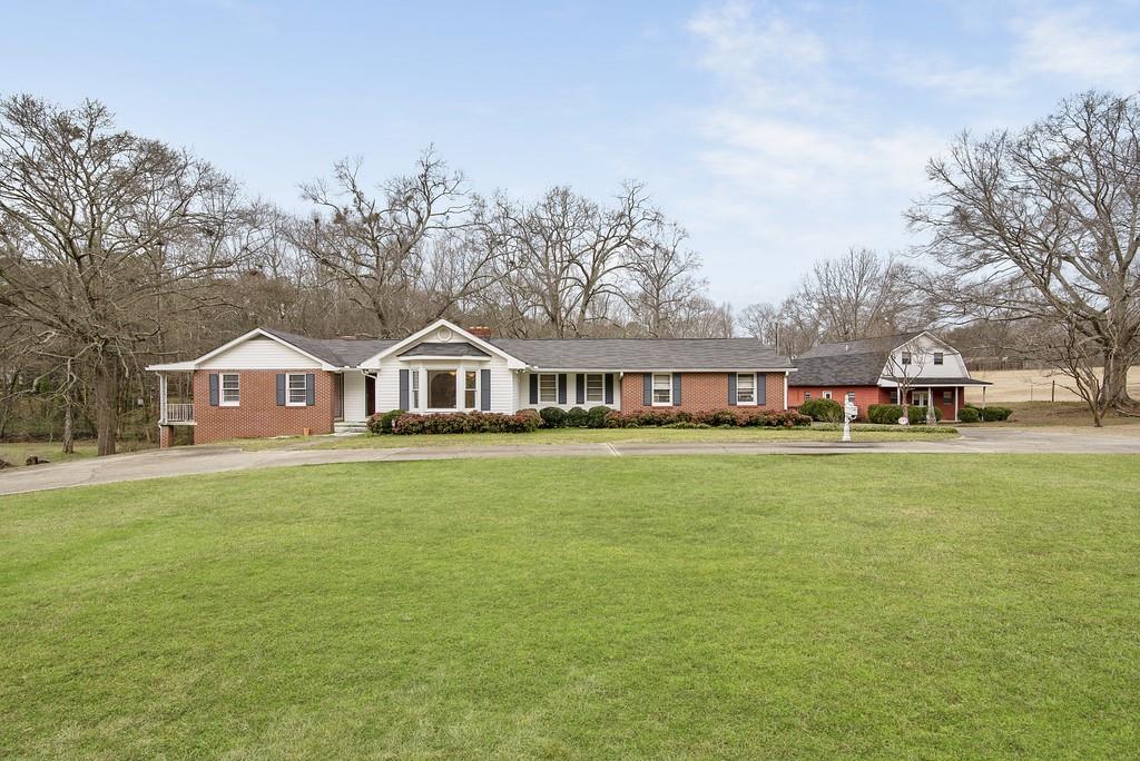 1.4 acres of history and convenience!
