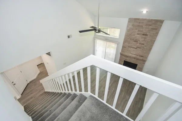 a view of a hallway with staircase