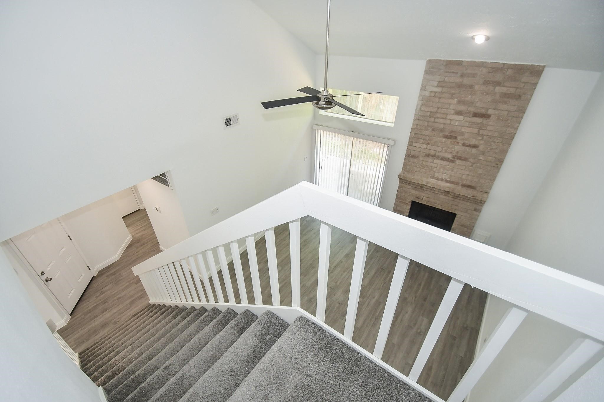 8803 Vinkins Road Houston, TX 77071 - Photo 5 of 9 a view of a hallway with staircase