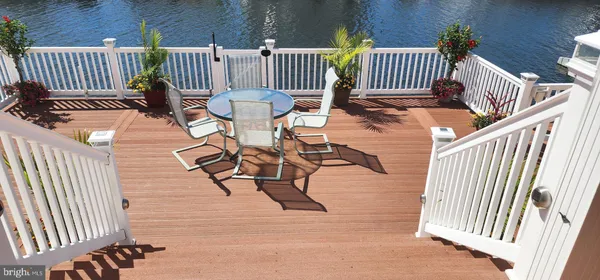 a view of balcony with furniture