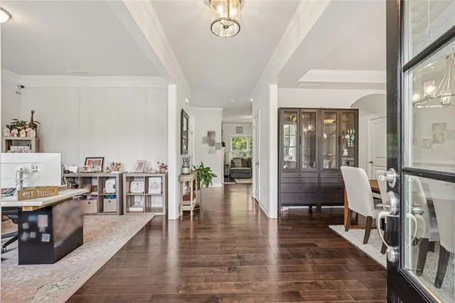 a view of a living room and dining room