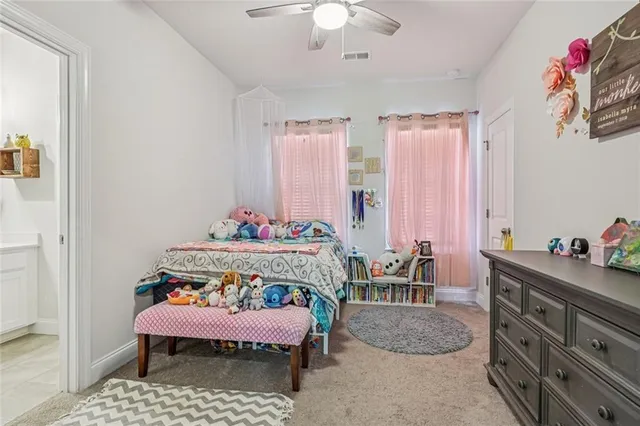 a bed room with a bed and a couch