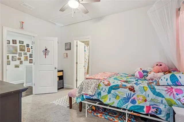 a bathroom with a sink toilet and mirror
