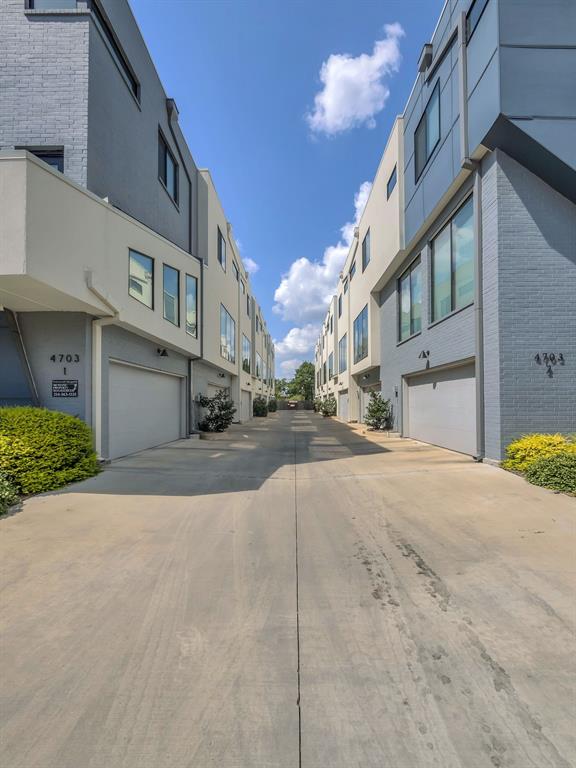 4703 Munger Avenue, Unit 101 Dallas, TX 75204 - Photo 24 of 26 a view of a street with buildings