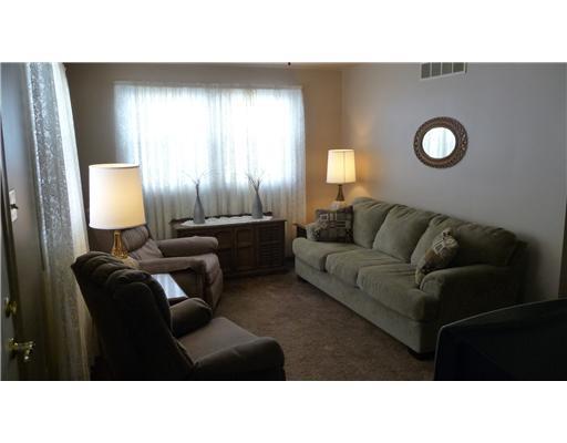 321 Mellon Road New Brighton, PA 15066 - Photo 2 of 7 Living Room. Lots of light in the living room.