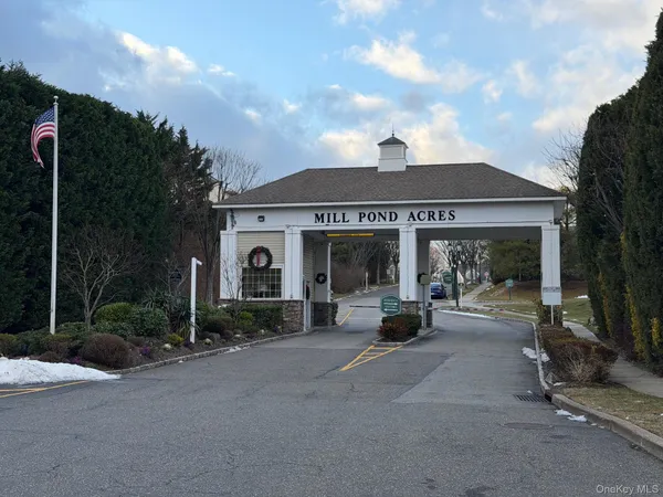 a view of a house with sitting area and garden