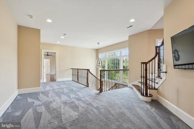 a spacious bathroom with a tub and sink