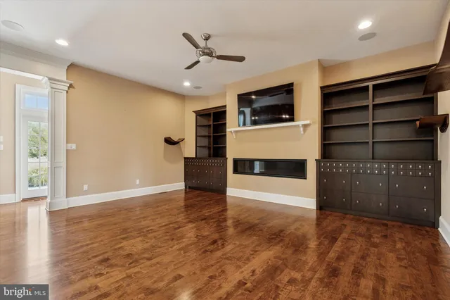 a room with furniture and wooden floors
