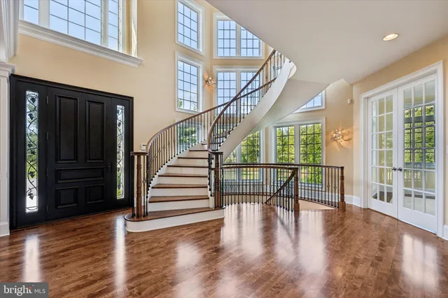 a view of entryway with livingroom and wooden floor