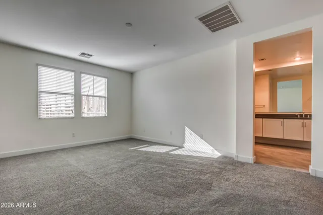 an empty room with windows