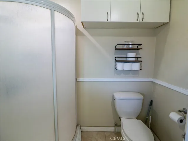 a bathroom with a toilet and a sink