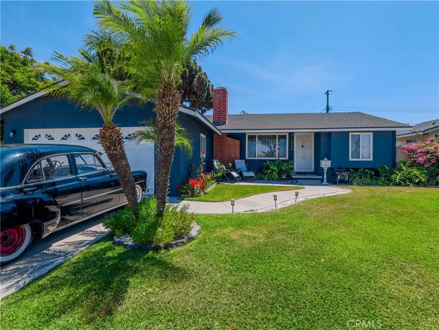 a view of a house with a swimming pool