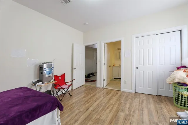 a workspace with furniture and bedroom view