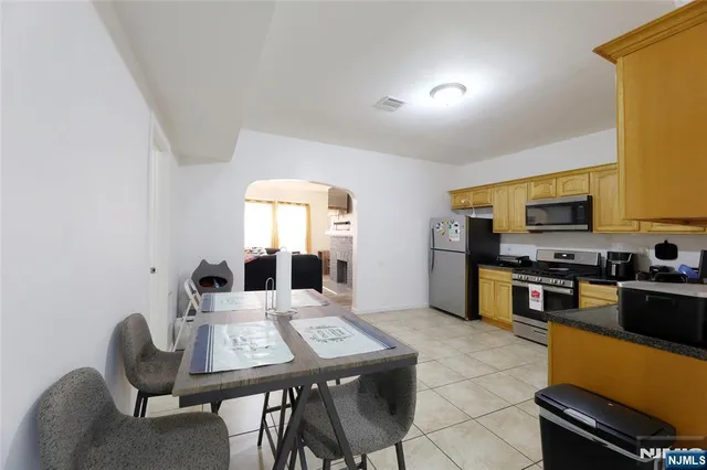 a bathroom with a sink a toilet and a bathtub