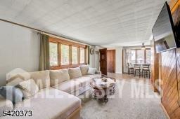 181 East Pleasant Grove Road Jackson, NJ 08527 - Photo 4 of 27 a living room with furniture and a large window