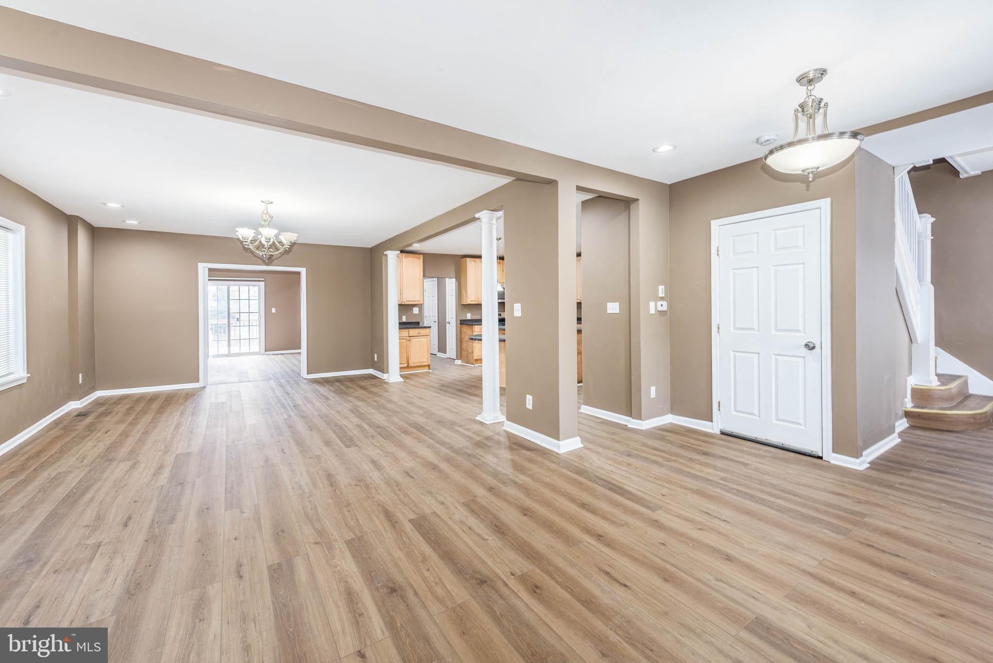 4021 Barrington Road Baltimore, MD 21207 - Photo 2 of 50 a view of a livingroom with wooden floor